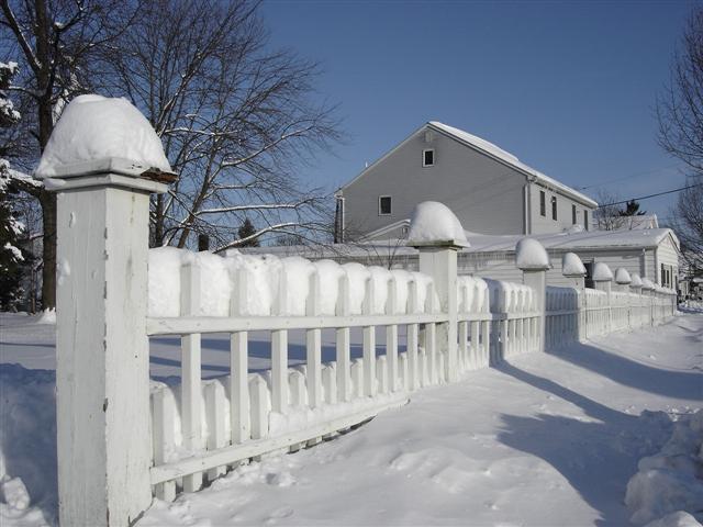 Snow on Victorian Open Picket Fence.