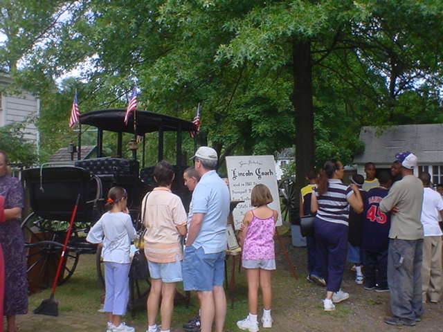Visitors View the Lincoln Coach