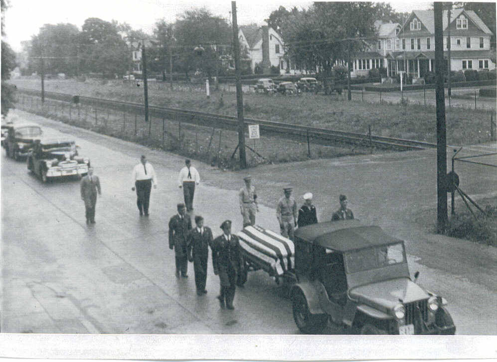 This funeral cortege is in honor of Frank Petroski, Seaman Second Class, United States Naval Reserve, who perished in action on April 17, 1944 .  He was buried at Saint James Cemetery in 1948. Thanks to the Petroski Family for these pictures.